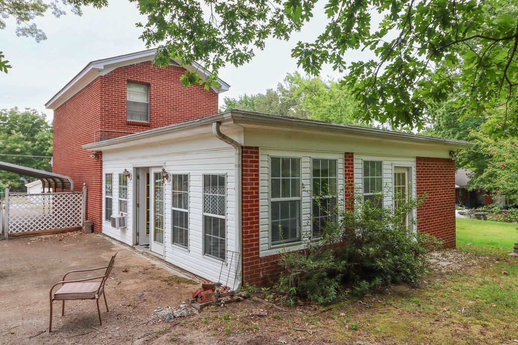 533 Best Street Ripley, TN 38063 - Photo 4 of 27 a view of a house with a yard
