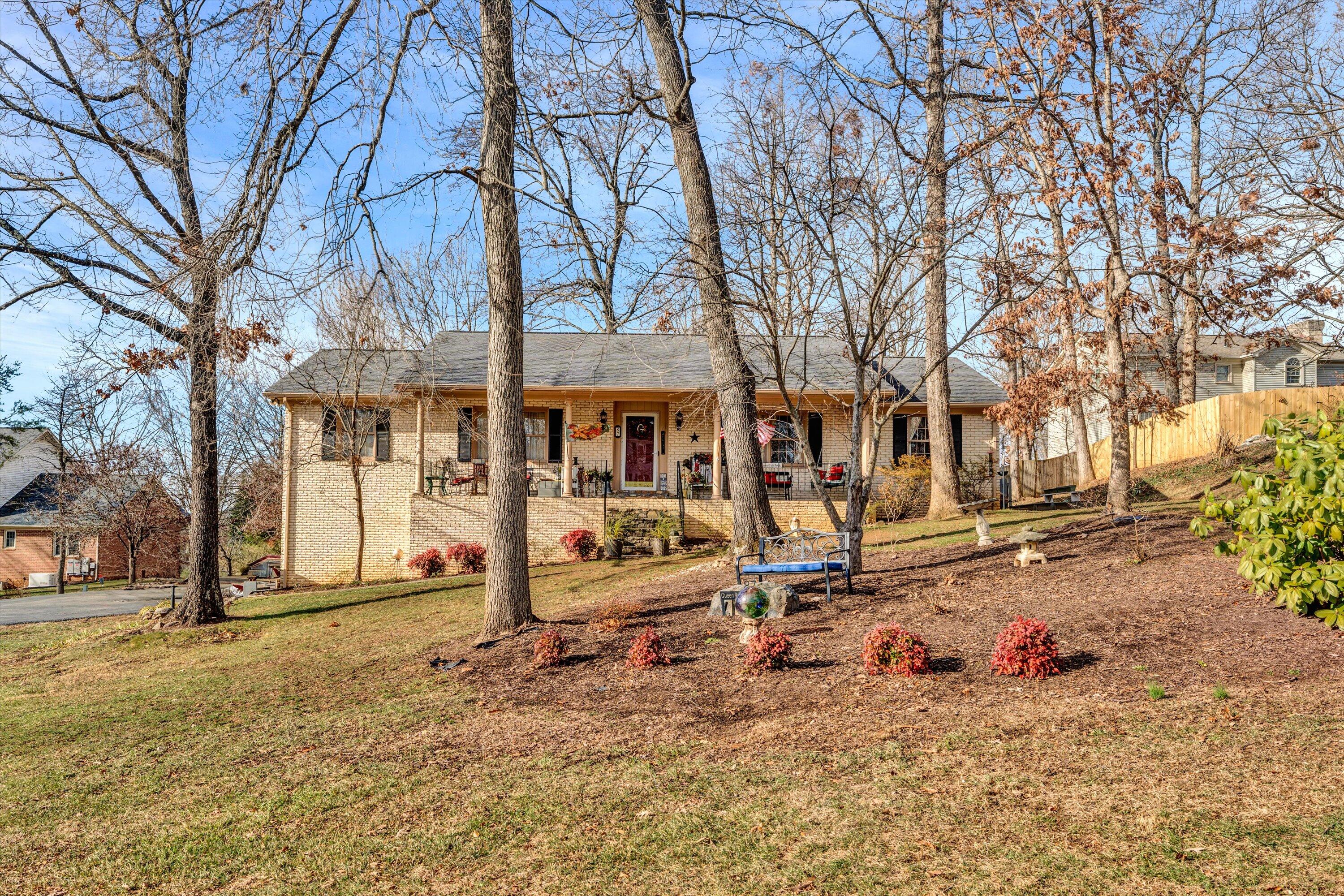87 Queen Regent Court Blue Ridge, VA 24064 - Photo 1 of 38 a view of a house with a yard covered in snow