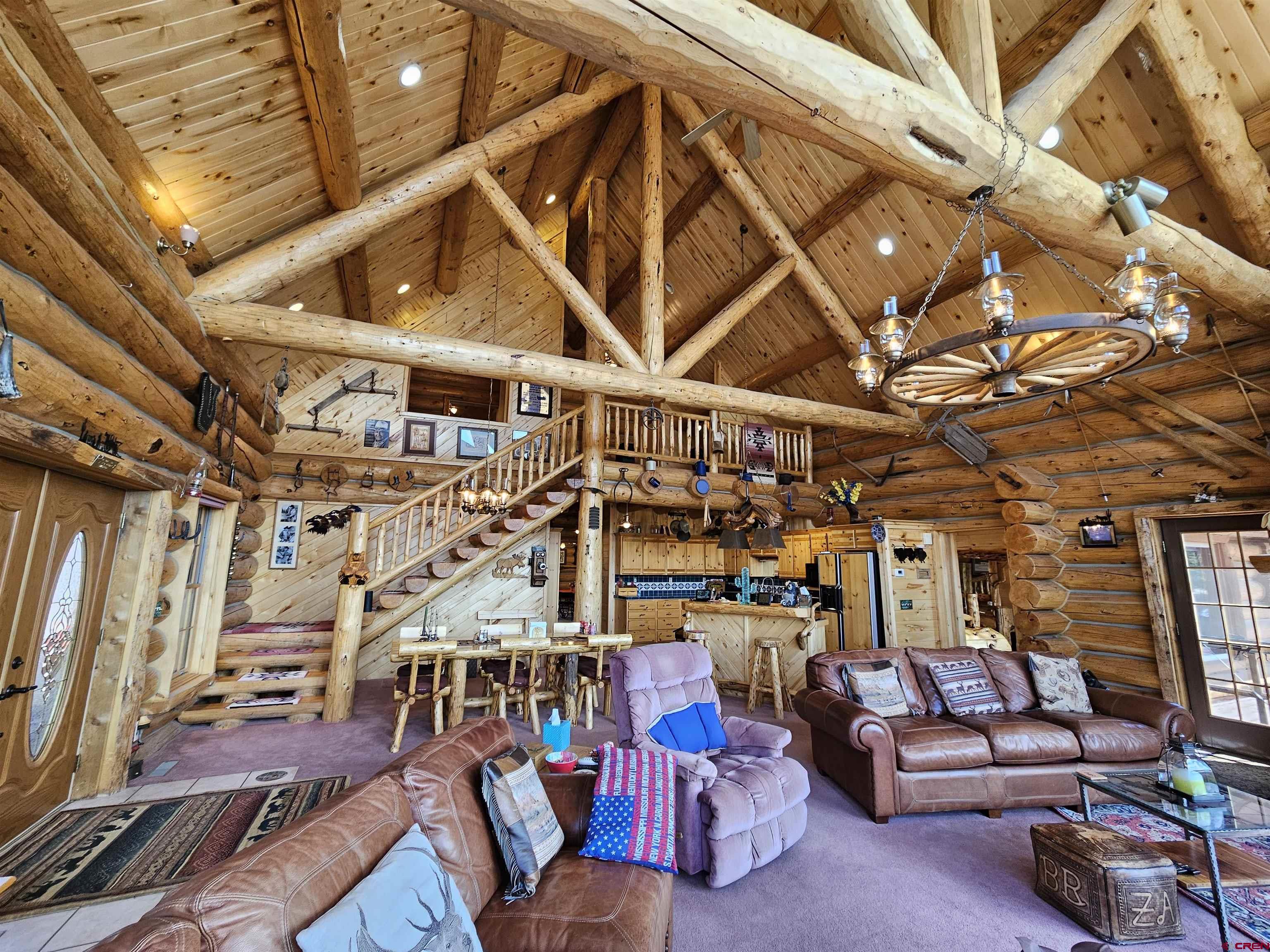 212 Pleasant Drive Ridgway, CO 81432 - Photo 11 of 35 a view of a big room with couch
