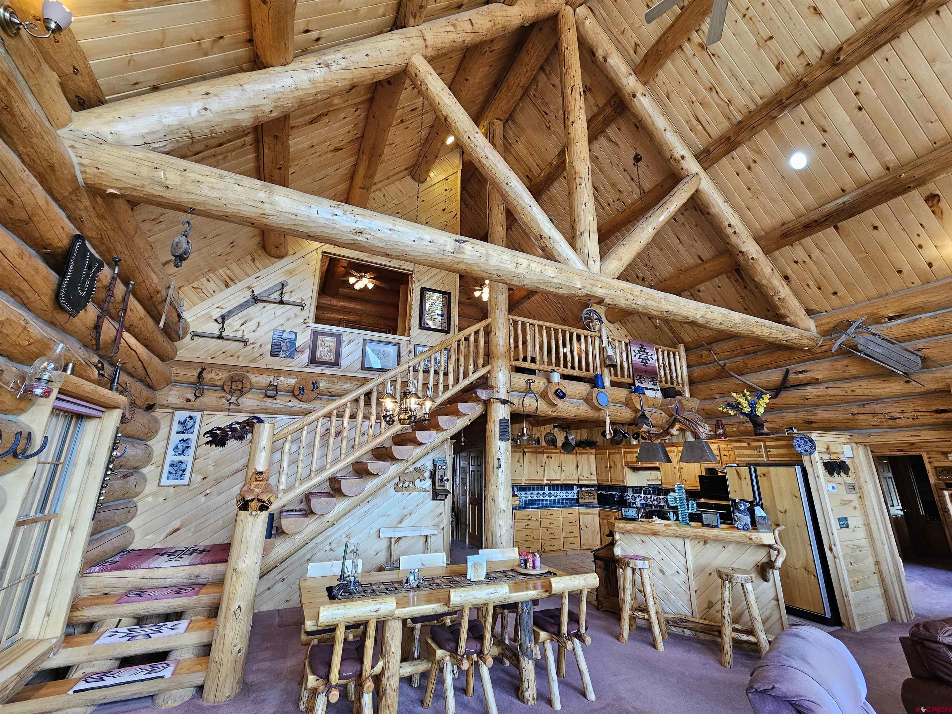 212 Pleasant Drive Ridgway, CO 81432 - Photo 29 of 35 a view of a room with lots of wooden furniture