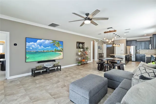 a spacious bedroom with a bed and window