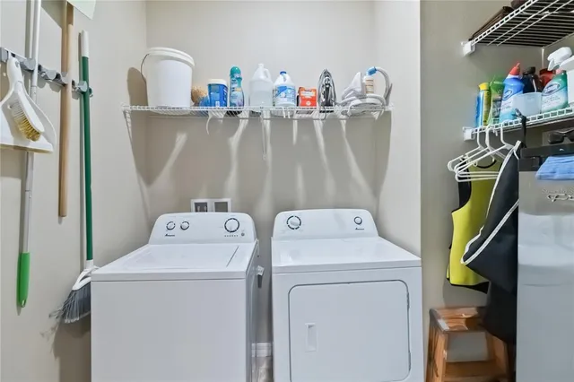 a bedroom with a bed and ceiling fan