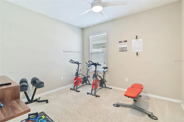 a view of a backyard with a sitting area