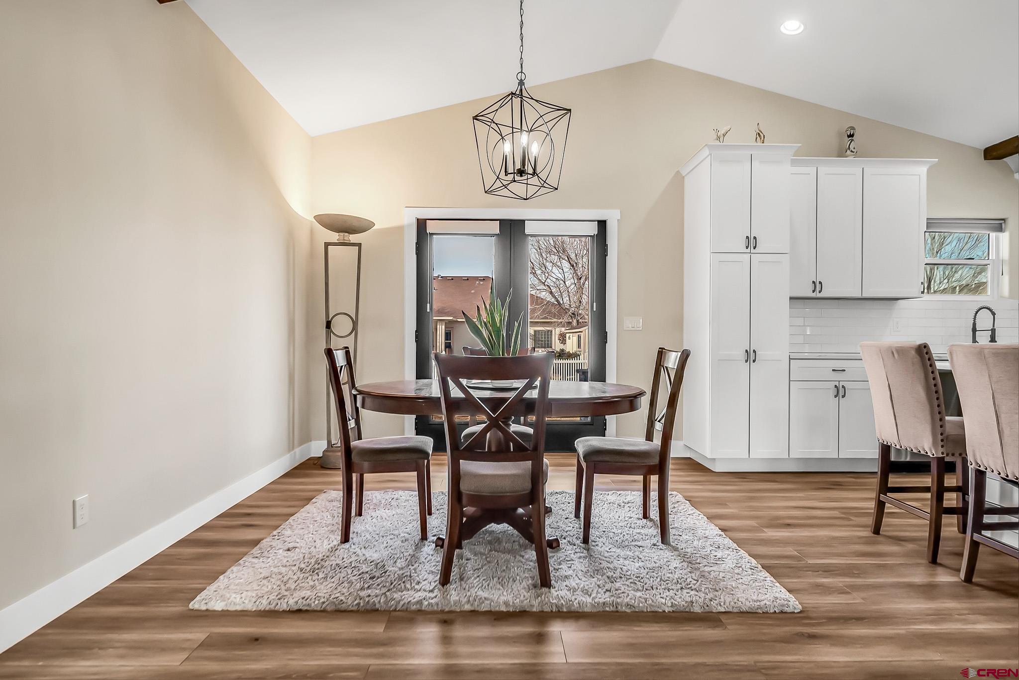 3337 Congress Street Montrose, CO 81401 - Photo 13 of 33 a view of a dining room with furniture window and wooden floor