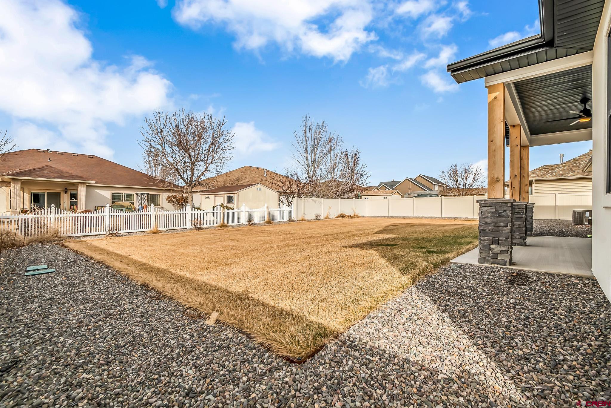 3337 Congress Street Montrose, CO 81401 - Photo 26 of 33 a view of a house with a yard