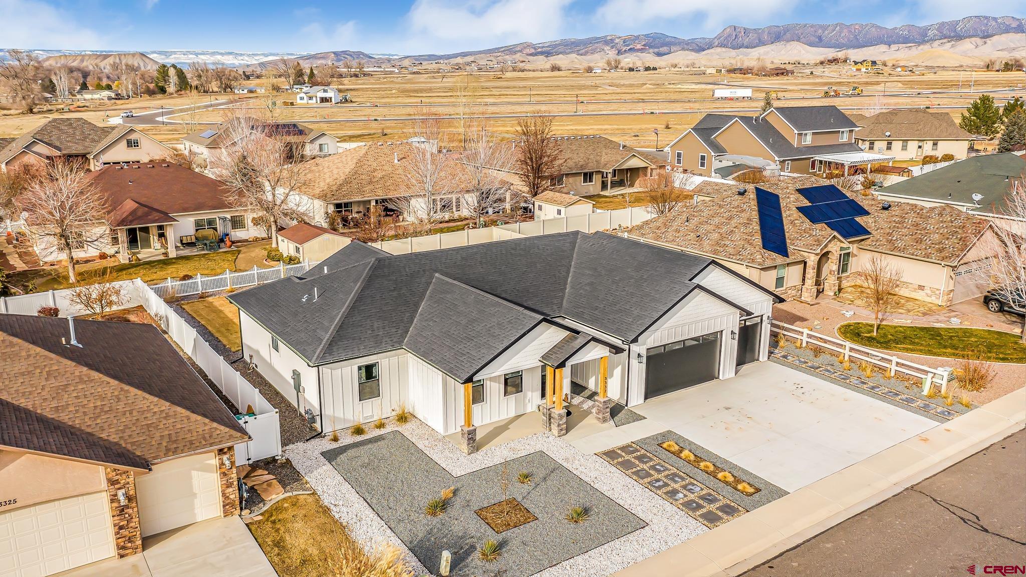 3337 Congress Street Montrose, CO 81401 - Photo 29 of 33 an aerial view of residential houses with outdoor space