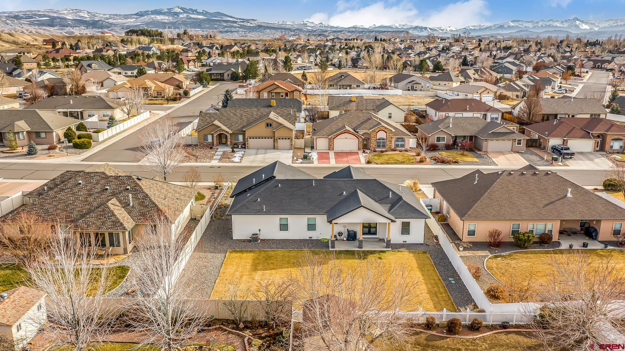 3337 Congress Street Montrose, CO 81401 - Photo 32 of 33 an aerial view of a house with a swimming pool