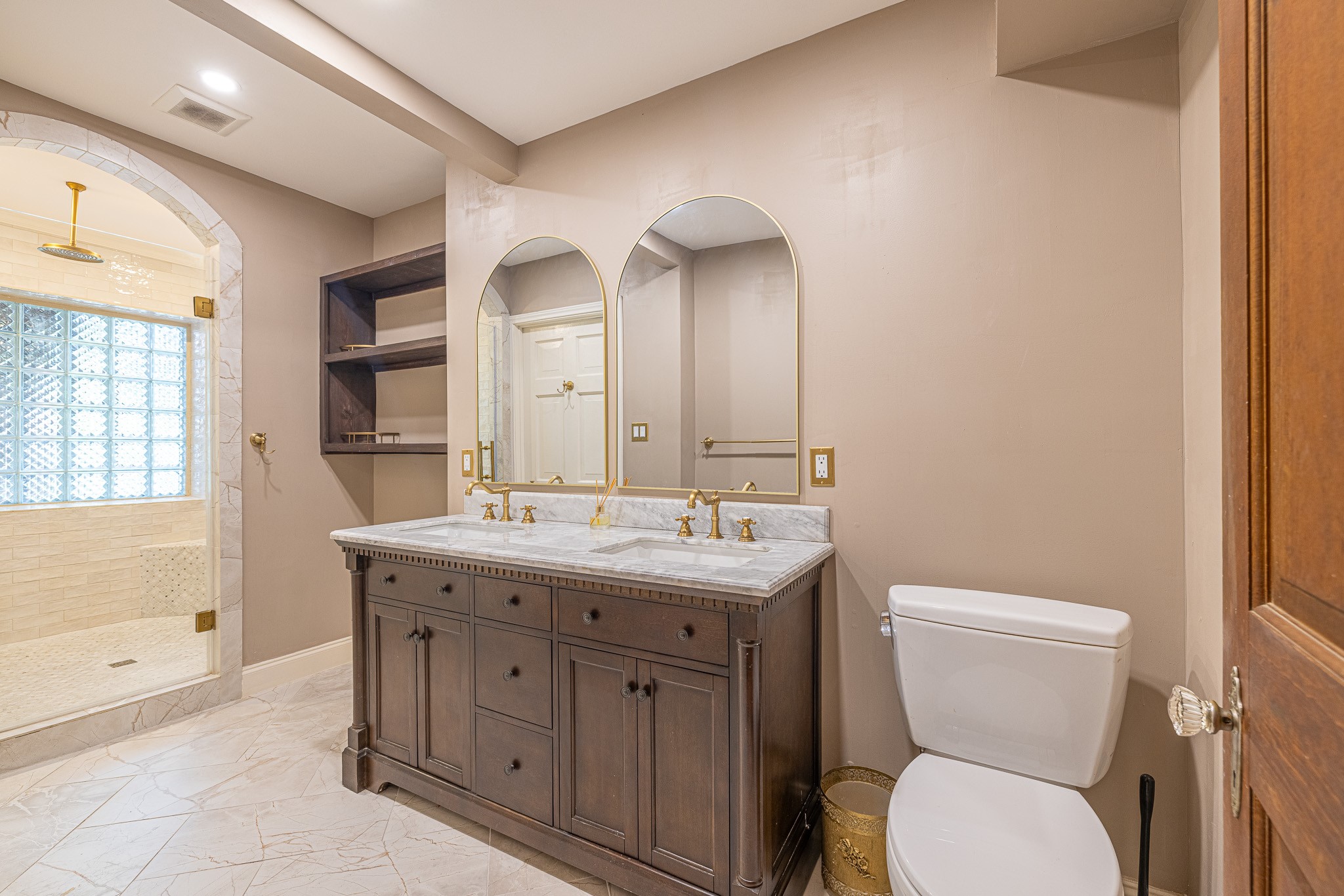 8548 Findlay Street Houston, TX 77017 - Photo 20 of 50 a bathroom with a toilet a sink and mirror