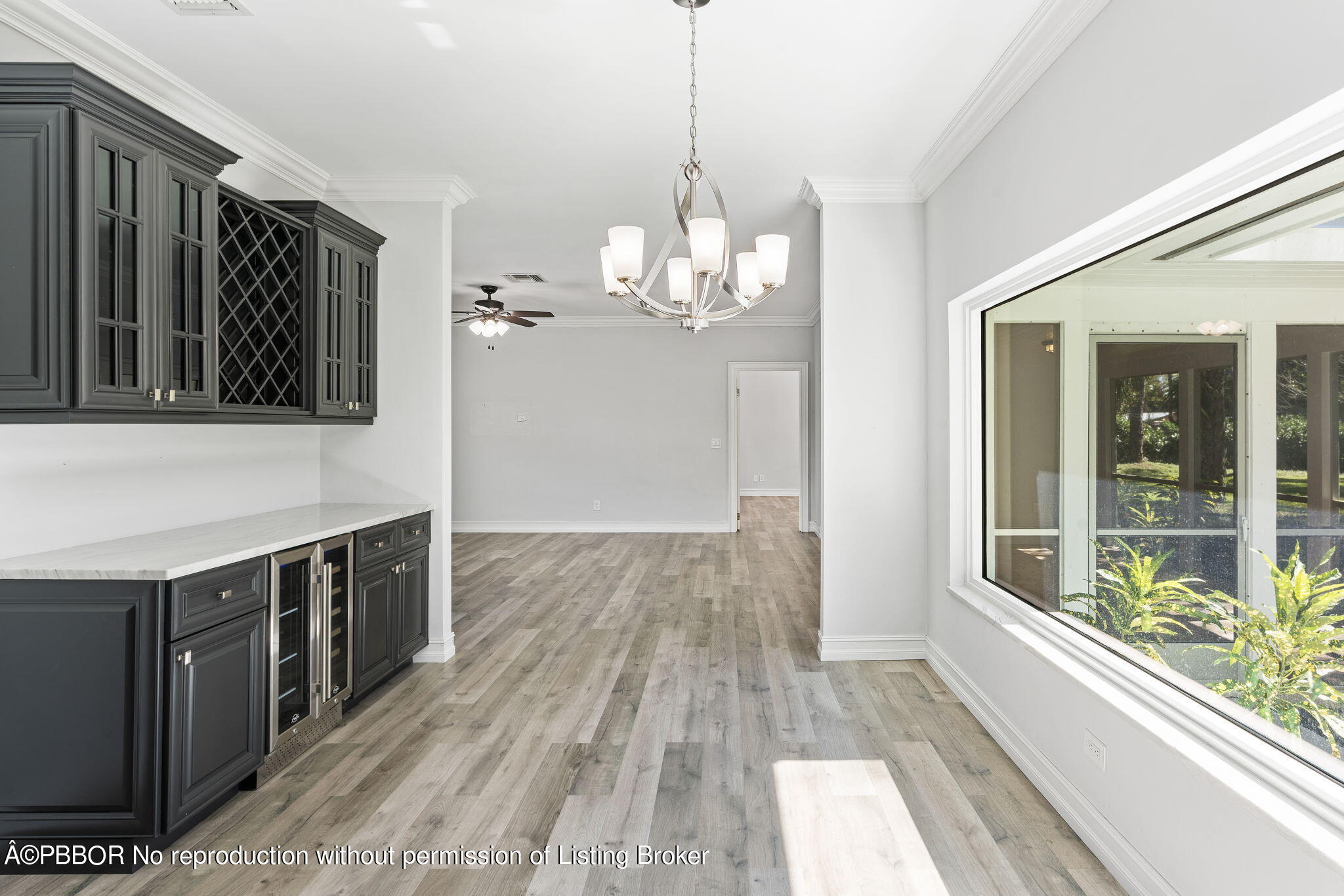 5608 Old Fort Jupiter Road Jupiter, FL 33458 - Photo 18 of 59 a view of a kitchen from the hallway