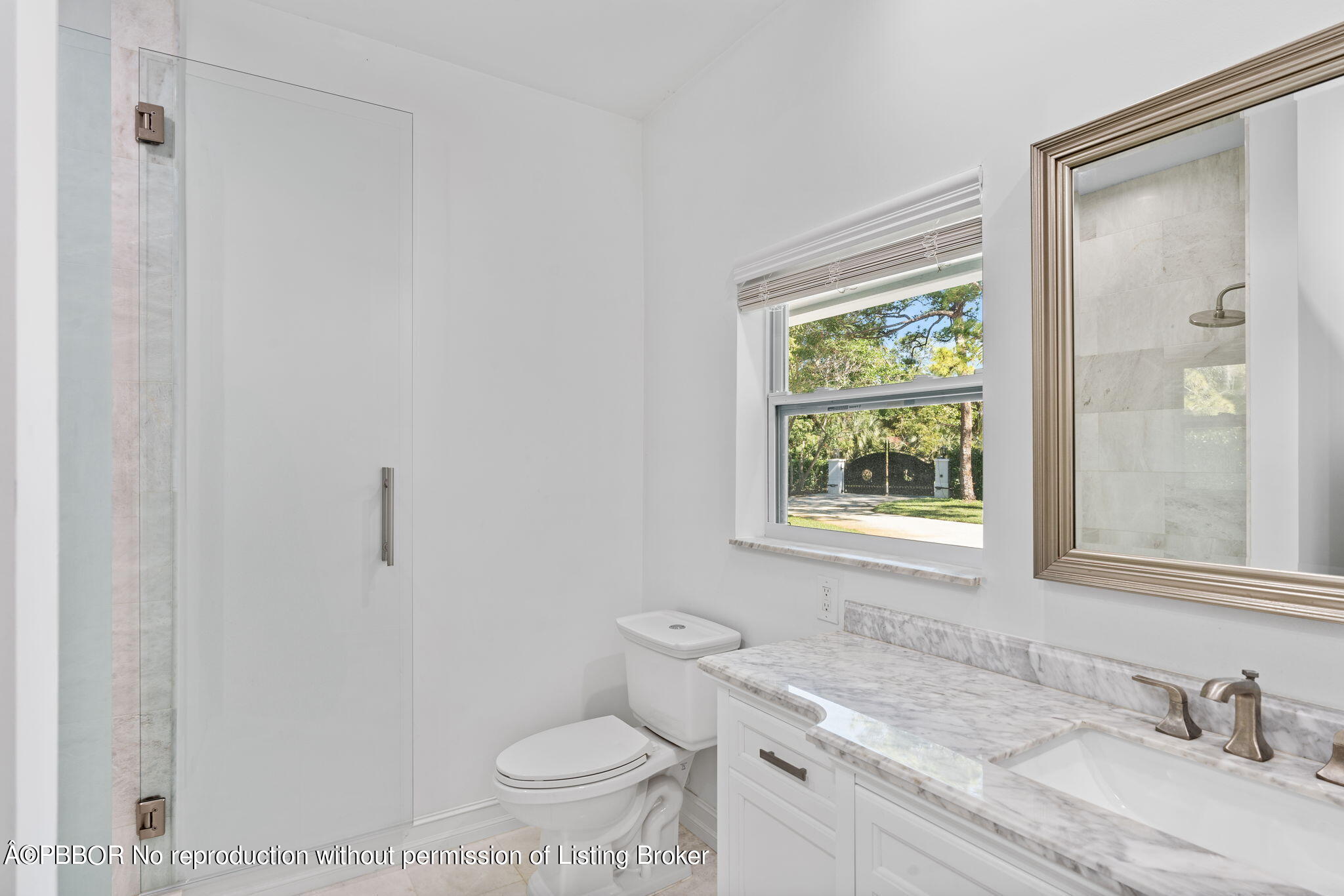 5608 Old Fort Jupiter Road Jupiter, FL 33458 - Photo 24 of 59 a bathroom with a granite countertop sink toilet and shower