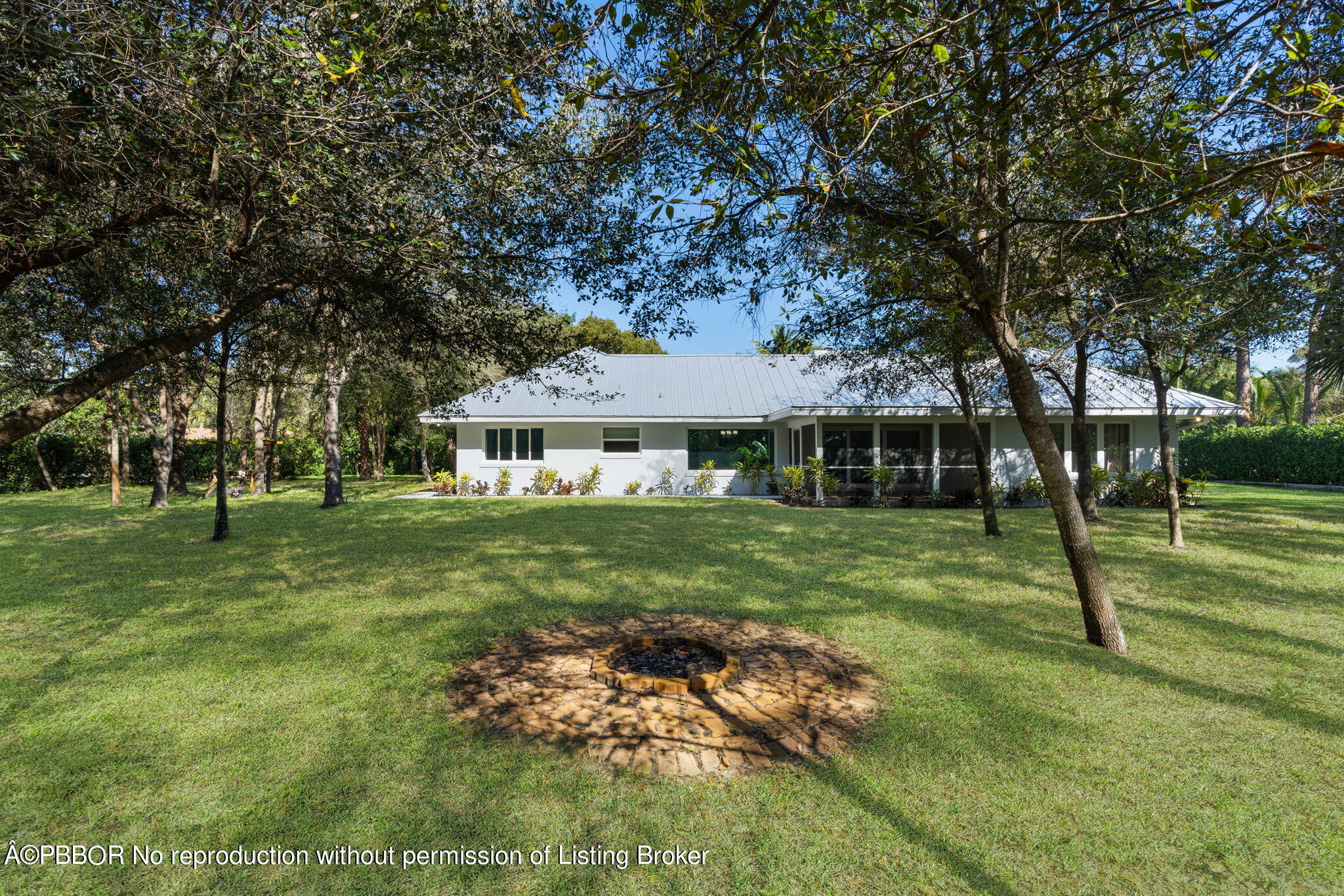 5608 Old Fort Jupiter Road Jupiter, FL 33458 - Photo 39 of 59 a view of a house with a yard