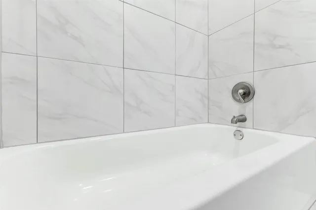 a bathroom with a bathtub