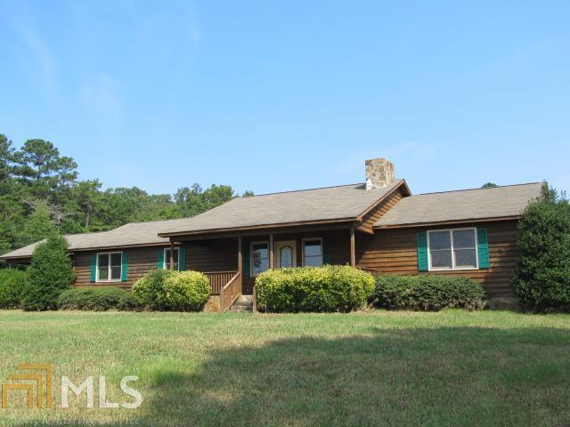 792 Hunt Road LaGrange, GA 30241 - Photo 1 of 1 a front view of a house with a yard