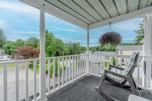 a view of a two chairs in the roof deck