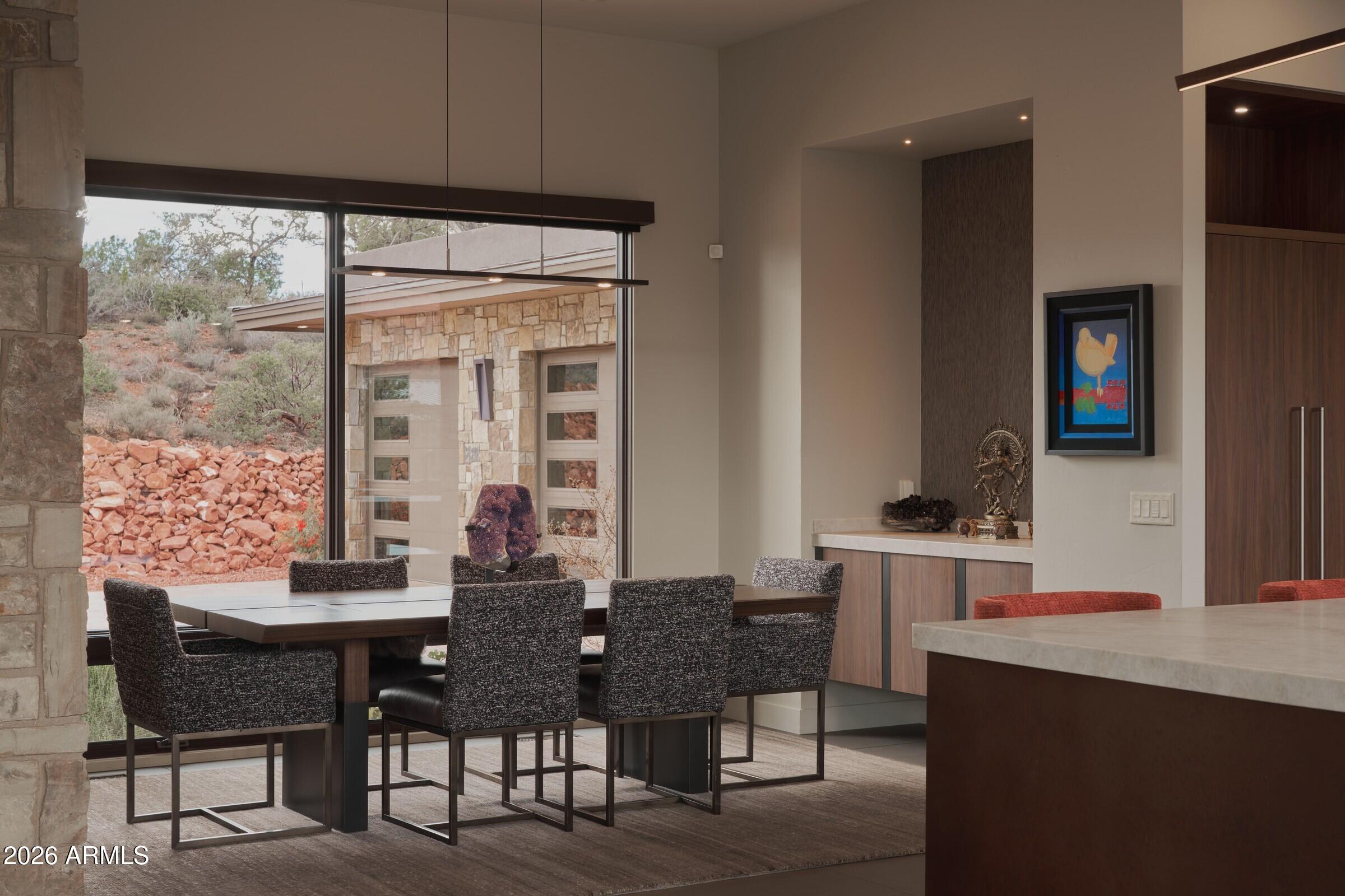 2925 Red Hawk Lane Sedona, AZ 86336 - Photo 14 of 35 a dining room with furniture and window