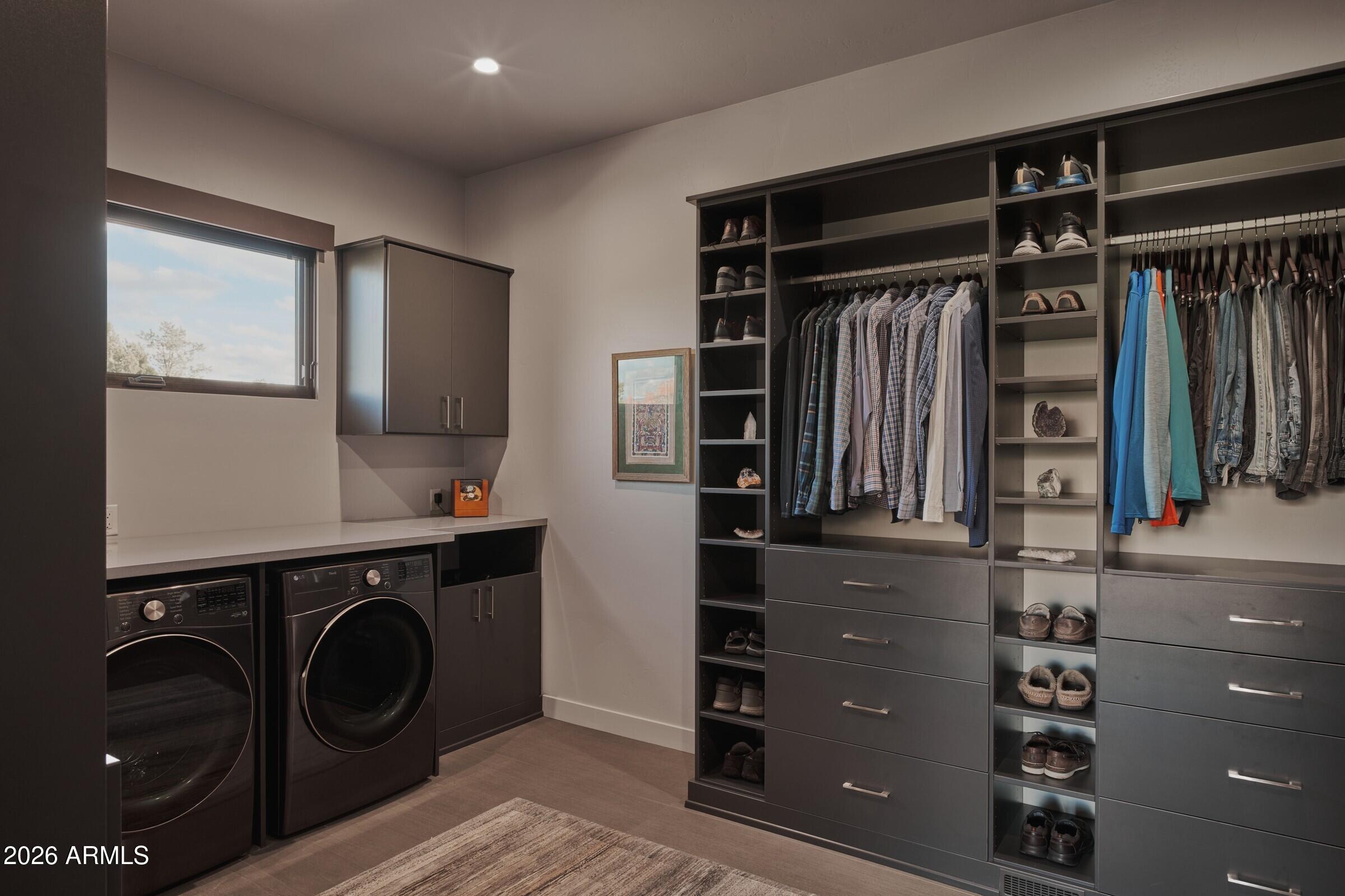 2925 Red Hawk Lane Sedona, AZ 86336 - Photo 20 of 35 a view of walk in closet with clothes and shoes