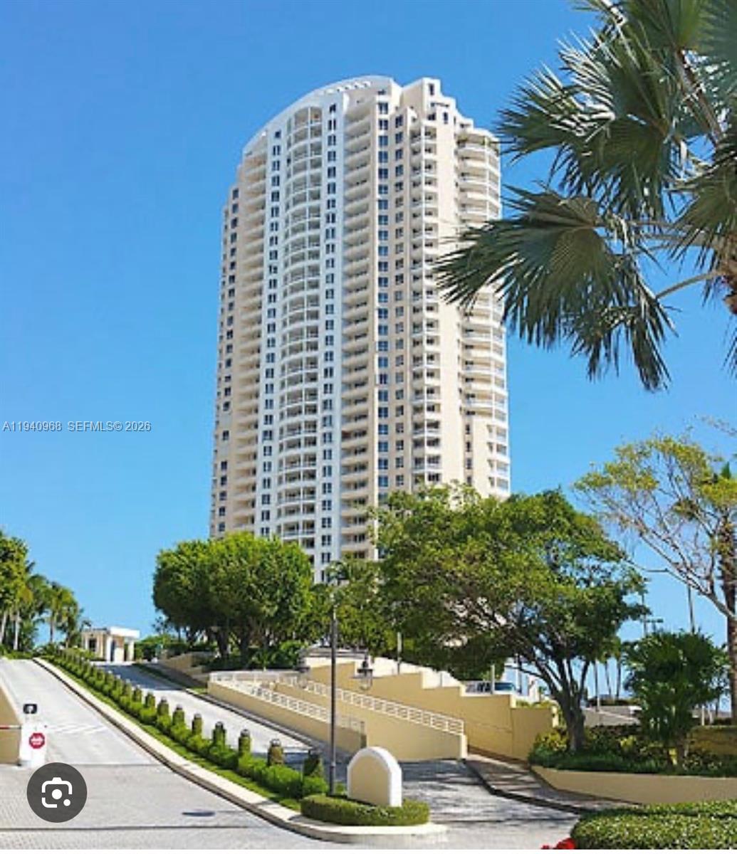 808 Brickell Key Drive, Unit 1202 Miami, FL 33131 - Photo 2 of 2 a front view of a multi story building