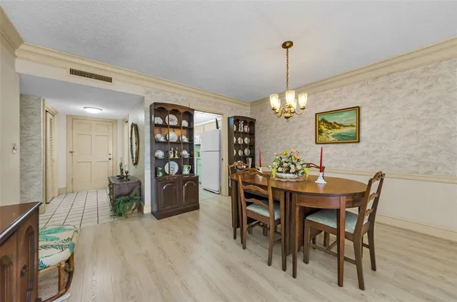 a view of a dining room with furniture