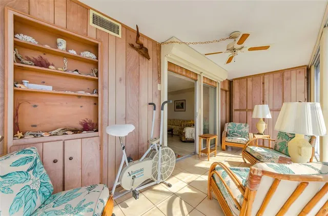 a view of a bedroom with a bed and furniture