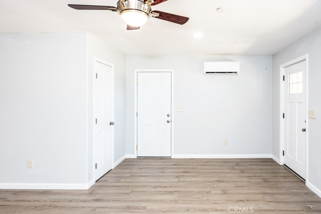 19208 Stonegate Road Hidden Valley Lake, CA 95467 - Photo 3 of 35 Entry, coat closet, garage door and mini split.