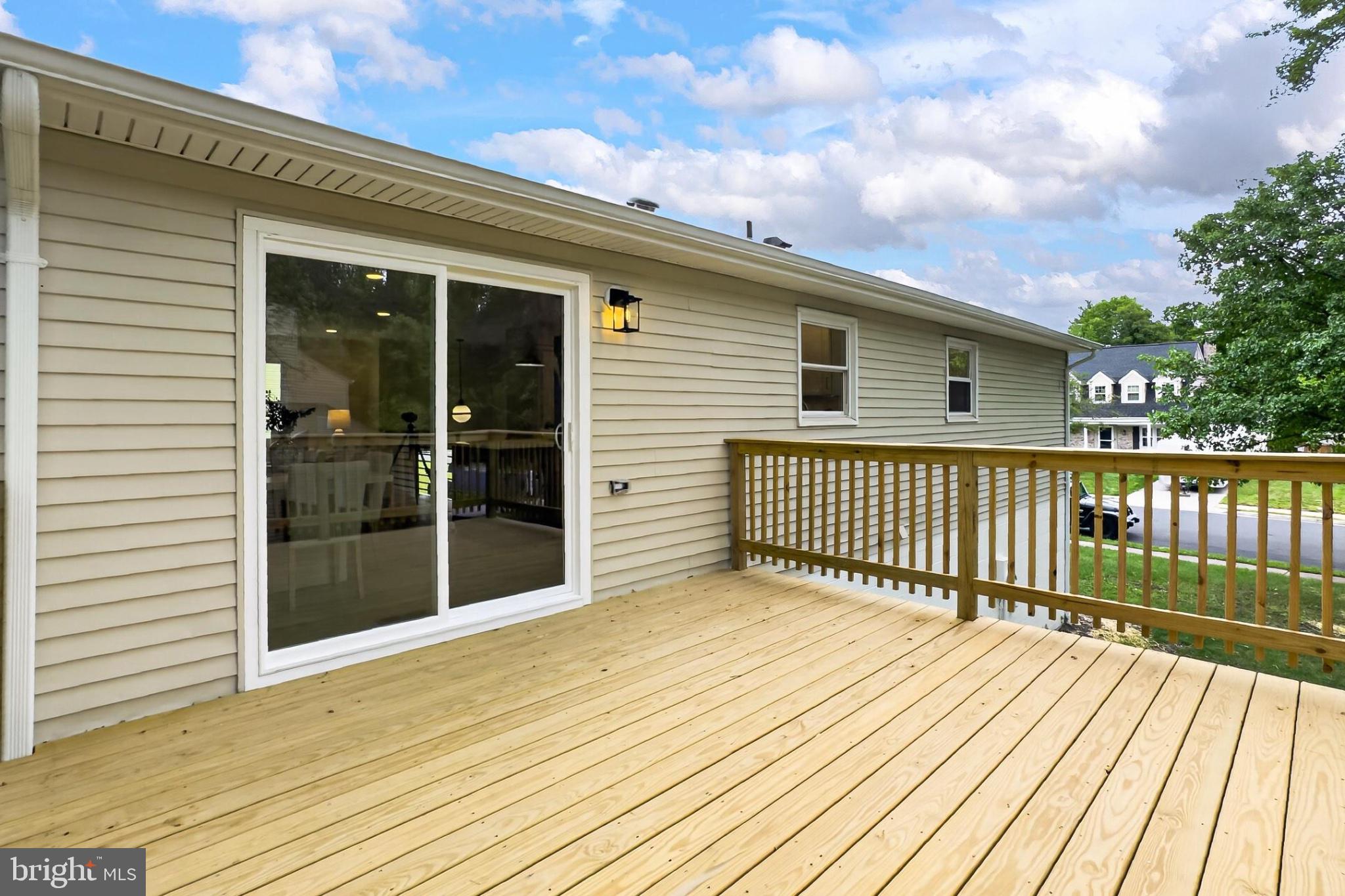 7124 Whetstone Road Alexandria, VA 22306 - Photo 35 of 37 Sunny deck with inviting views.