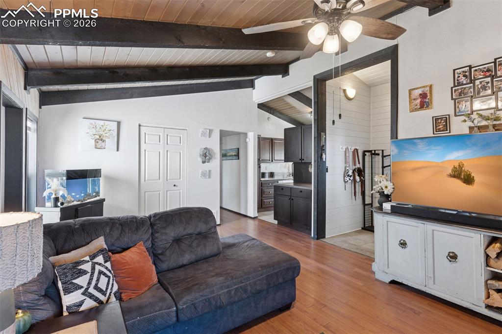 16880-1688 Old Pueblo Road Fountain, CO 80817 - Photo 25 of 47 View from living area toward the kitchen and adjacent spaces, highlighting the open flow and functional layout