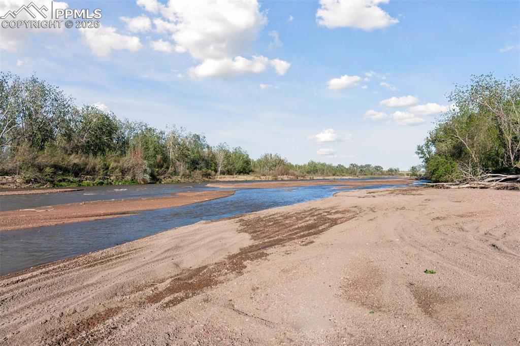 16880-1688 Old Pueblo Road Fountain, CO 80817 - Photo 41 of 47 Downstream view of Fountain Creek with seasonal sandbars and riparian greenery
