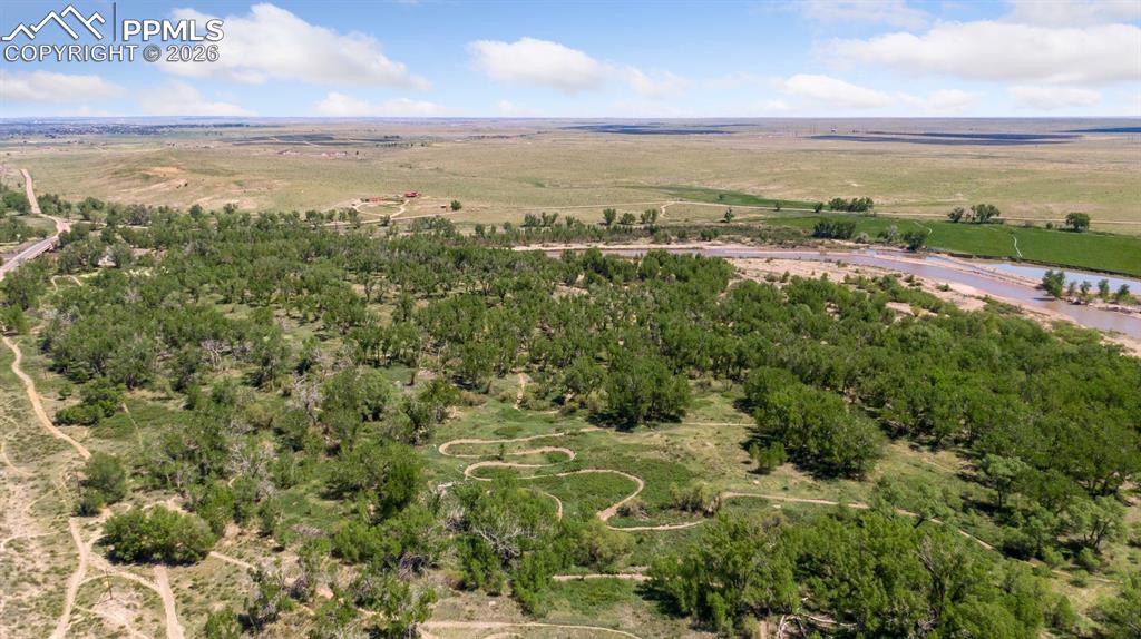16880-1688 Old Pueblo Road Fountain, CO 80817 - Photo 5 of 47 View capturing the scale of the property and a portion of its extensive private motocross trail network, thoughtfully integrated into the natural landscape