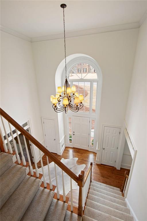 715 Winterwind Way Roswell, GA 30075 - Photo 28 of 83 a view of a hallway with wooden floor windows and entryway