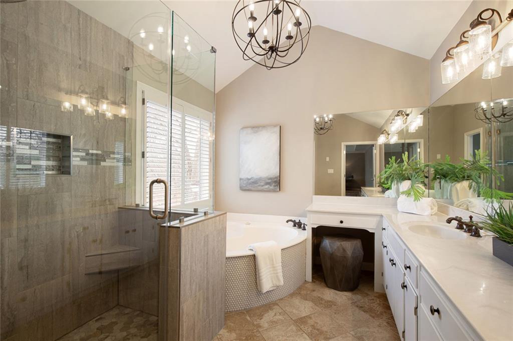715 Winterwind Way Roswell, GA 30075 - Photo 37 of 83 a bathroom with a sink a washer and dryer