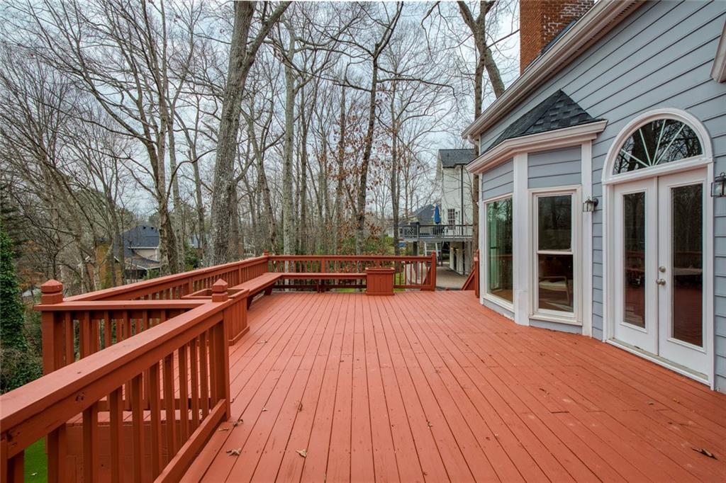 715 Winterwind Way Roswell, GA 30075 - Photo 50 of 83 a view of balcony with deck and wooden floor