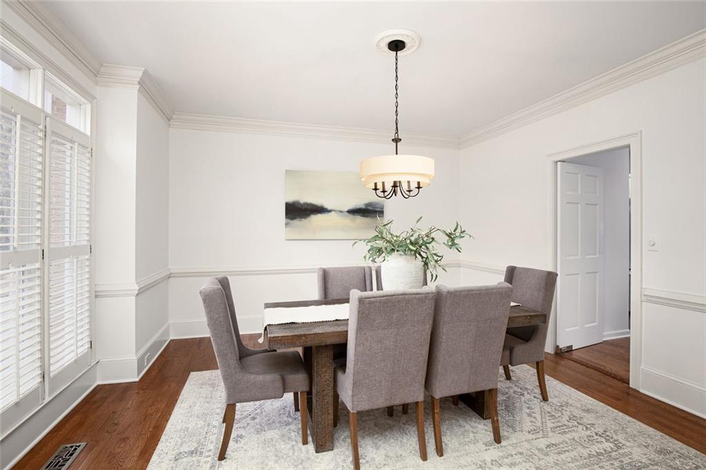 715 Winterwind Way Roswell, GA 30075 - Photo 5 of 83 a view of a dining room with furniture window and wooden floor