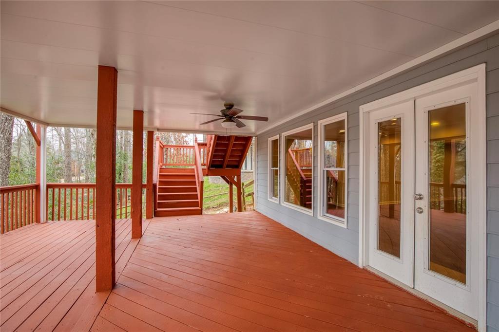 715 Winterwind Way Roswell, GA 30075 - Photo 56 of 83 a view of a porch with wooden floor and outdoor space