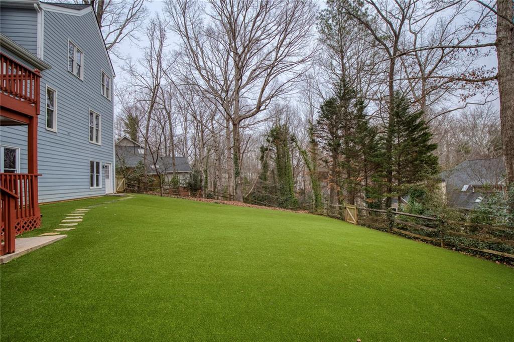 715 Winterwind Way Roswell, GA 30075 - Photo 59 of 83 a view of a backyard with large trees
