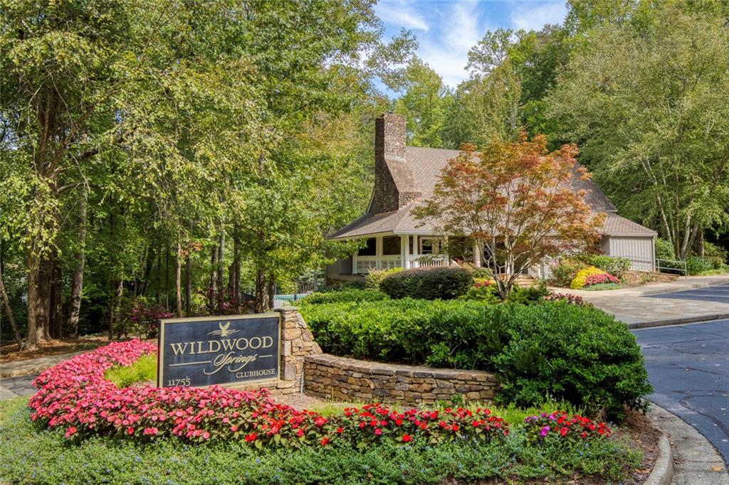 715 Winterwind Way Roswell, GA 30075 - Photo 67 of 83 a view of a garden with flowers and trees