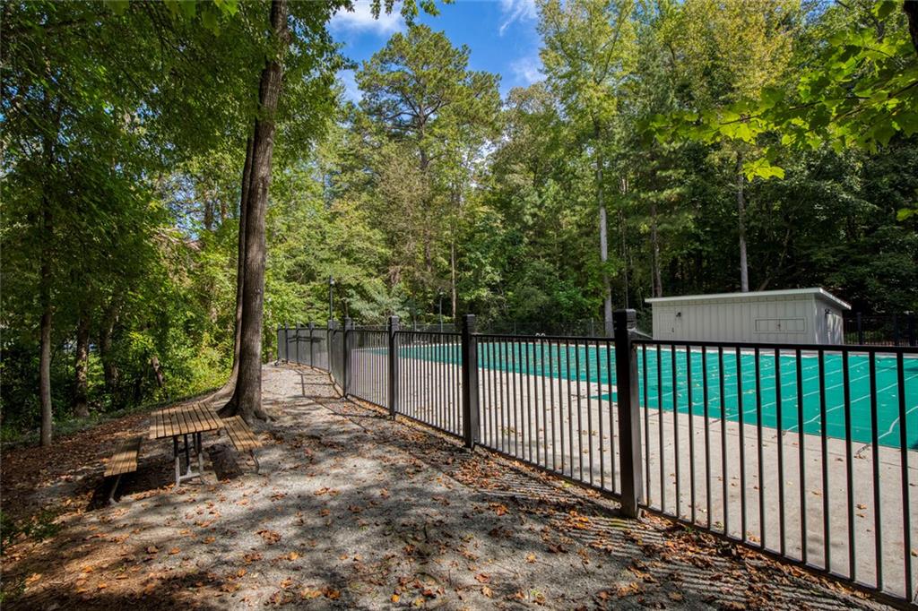 715 Winterwind Way Roswell, GA 30075 - Photo 72 of 83 a view of a wrought iron fences in front of yard