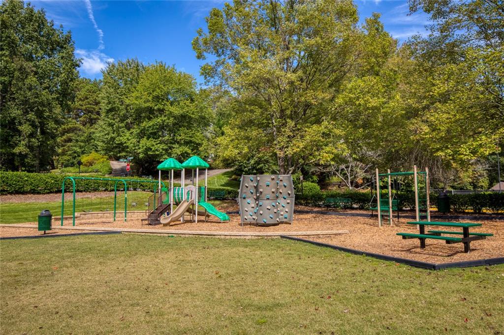 715 Winterwind Way Roswell, GA 30075 - Photo 77 of 83 a view of a park with slide