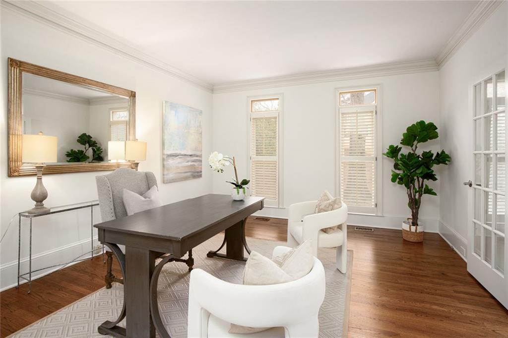 715 Winterwind Way Roswell, GA 30075 - Photo 9 of 83 a view of a livingroom with furniture window and wooden floor