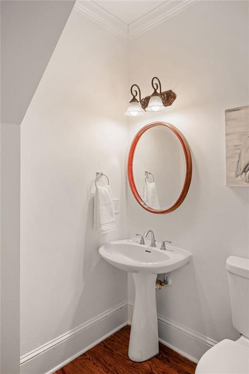 715 Winterwind Way Roswell, GA 30075 - Photo 10 of 83 a bathroom with a sink toilet and a mirror