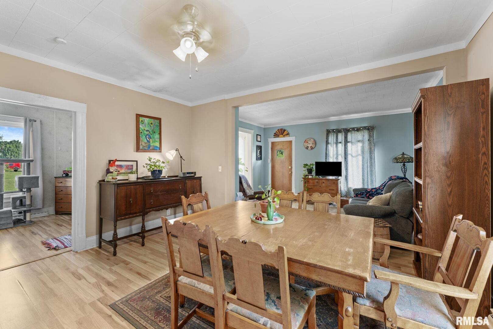 607 Northwest 8th Avenue Aledo, IL 61231 - Photo 8 of 22 a view of a dining room with furniture