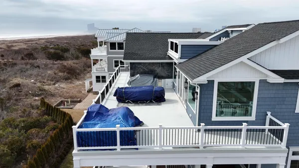 a bathroom with a sink a mirror and shower