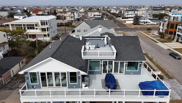 a view of roof with city view