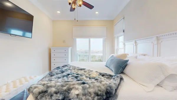 an aerial view of a house with a ocean view