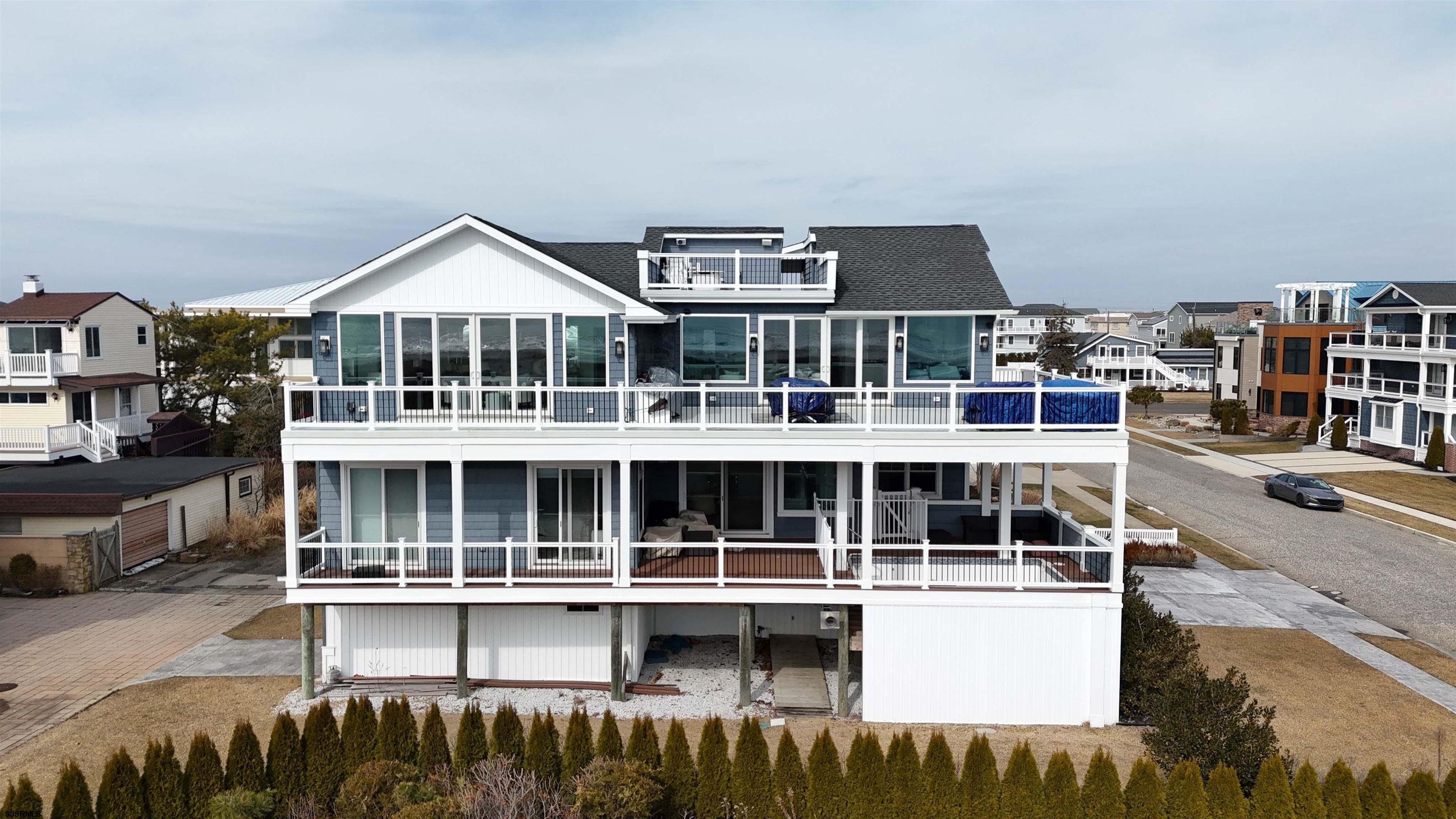 404 21st Street South Brigantine, NJ 08203 - Photo 85 of 92 a view of a large building with a street
