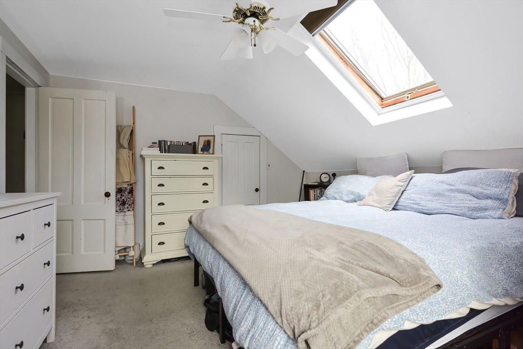 21 Cemetery Street, Unit 21 Hopedale, MA 01747 - Photo 11 of 19 a bedroom with a bed and a cabinets