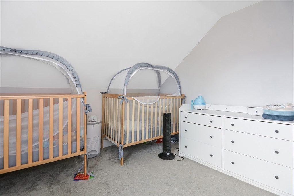 21 Cemetery Street, Unit 21 Hopedale, MA 01747 - Photo 15 of 19 a view of a livingroom with toys