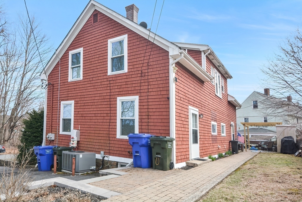 21 Cemetery Street, Unit 21 Hopedale, MA 01747 - Photo 18 of 19 a view of a house with a patio