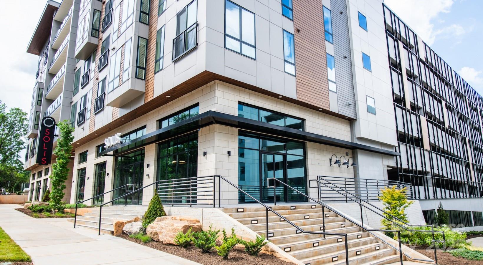 a view of a building with a street