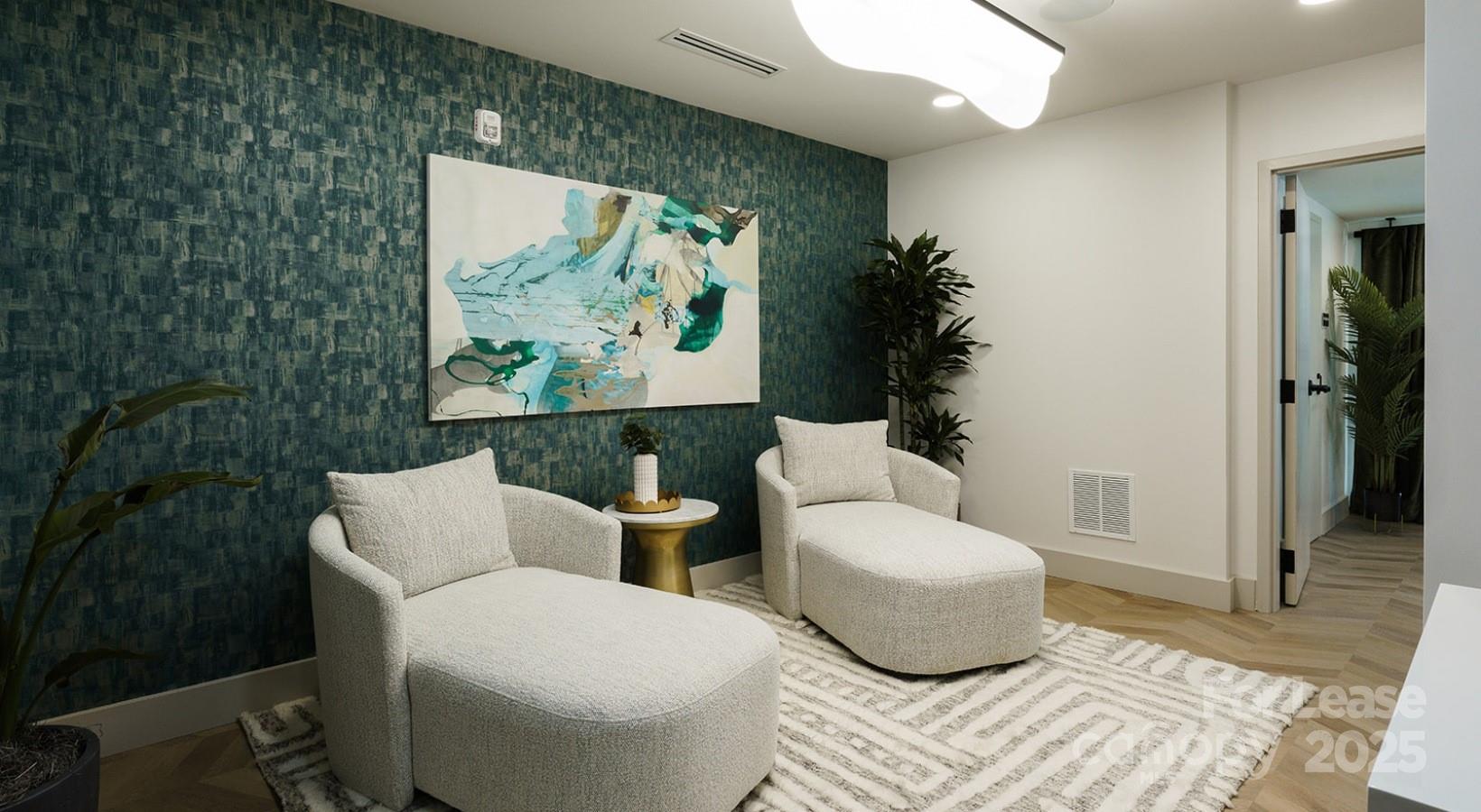 1133 Harding Place, Unit C2 Charlotte, NC 28204 - Photo 15 of 41 a living room with furniture and a painting on the wall