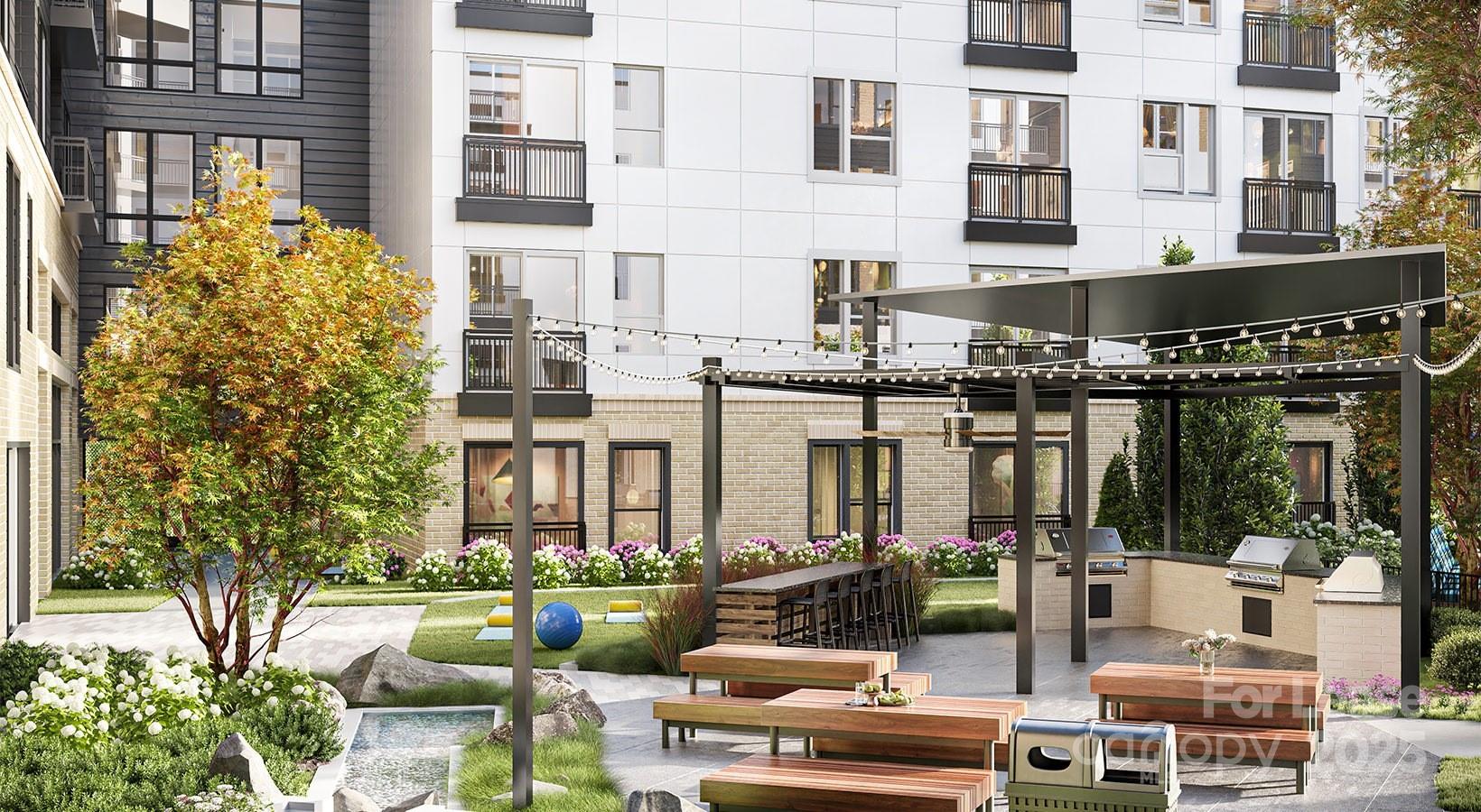 1133 Harding Place, Unit C2 Charlotte, NC 28204 - Photo 7 of 41 a front view of a building with balcony
